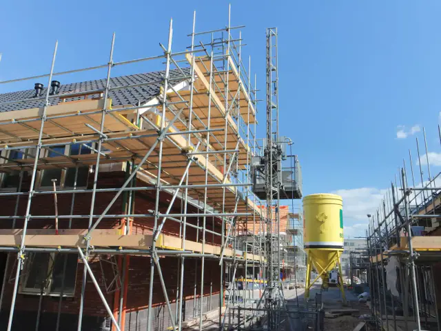 Scaffolding around homes on a new build housing development